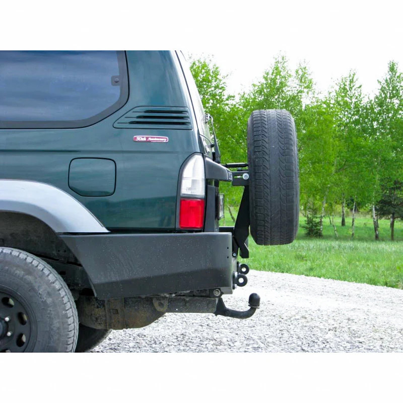 Zadný nárazník Toyota LCJ95 96-02 s rozšíreniami a otvormi pre svetlá