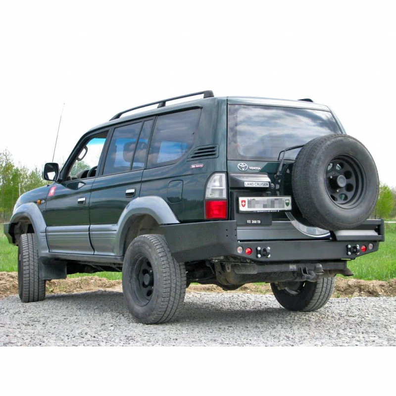 Zadný nárazník Toyota LCJ95 96-02 s rozšíreniami a otvormi pre svetlá